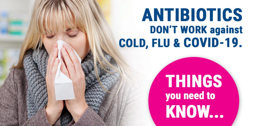 Close-up image of woman blowing nose into a tissue, wearing a large scarf. Overlaid text reads "Antibiotics don't work against cold, flu and COVID-19. Thing you need to know."